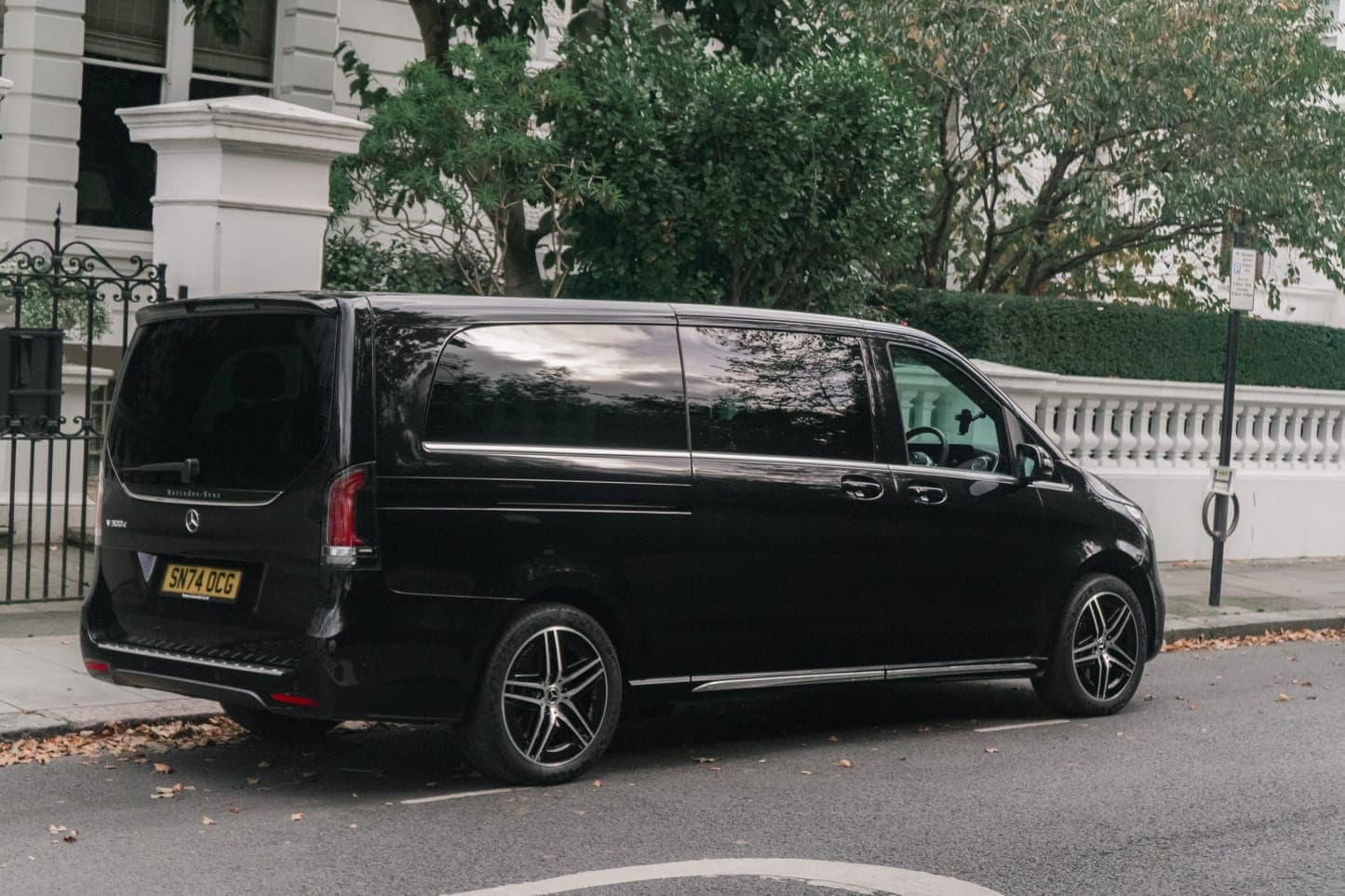 Black Mercedes V-Class parked on a London street